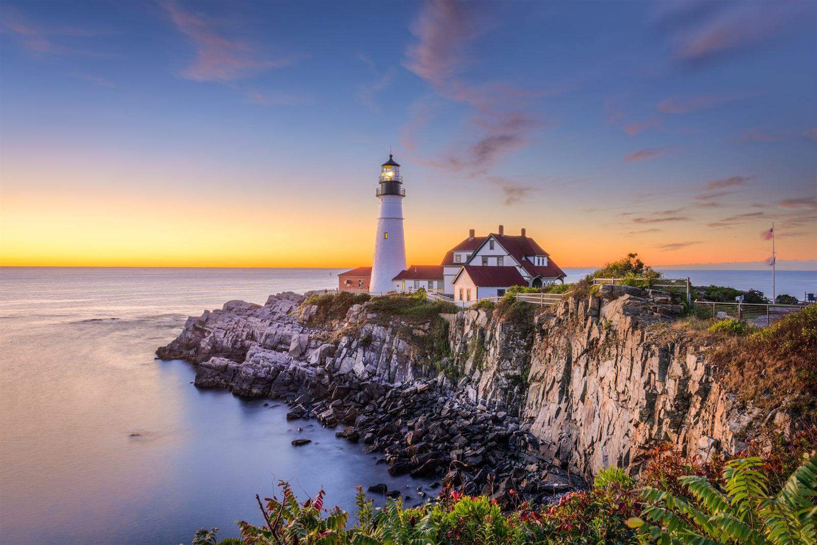 Portland Head Light on the rocky Maine coast at sunrise