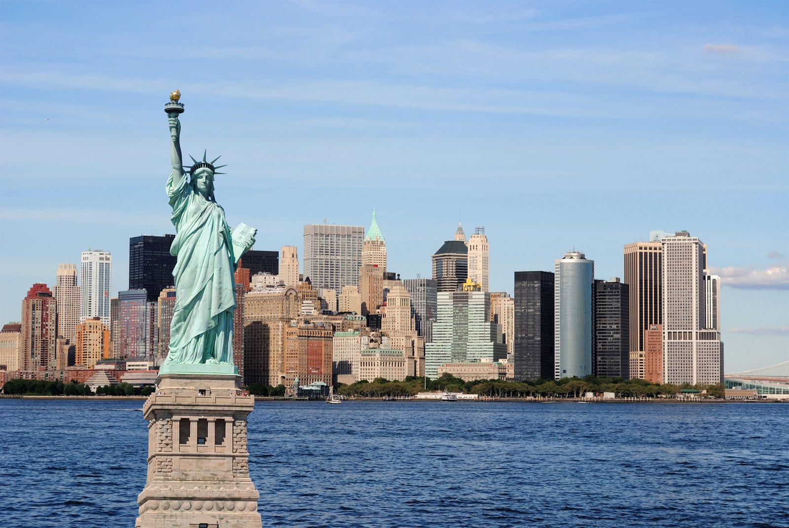 Statue of Liberty with the Lower Manhattan skyline behind